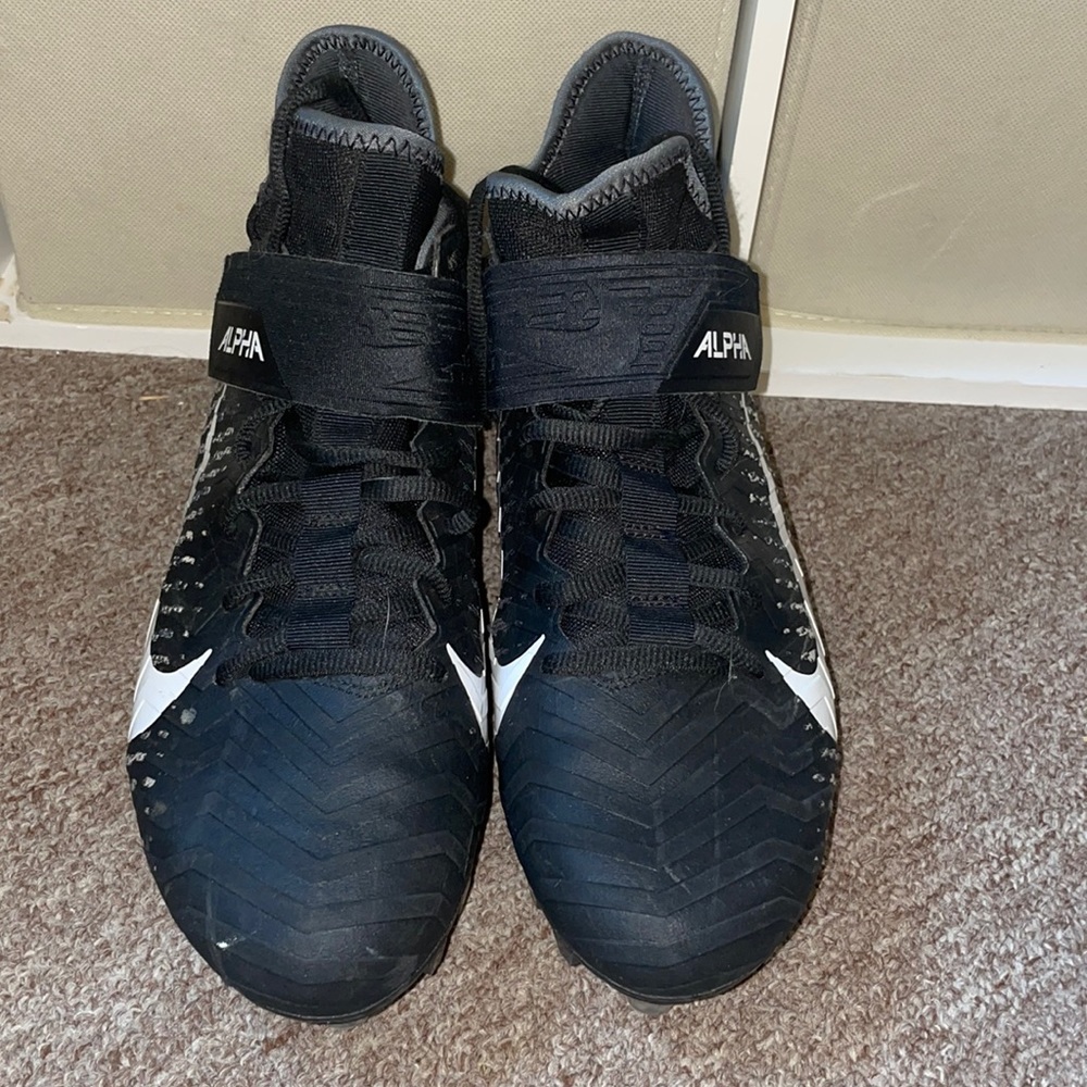 Guys alpha Nike football cleats / size 8.5